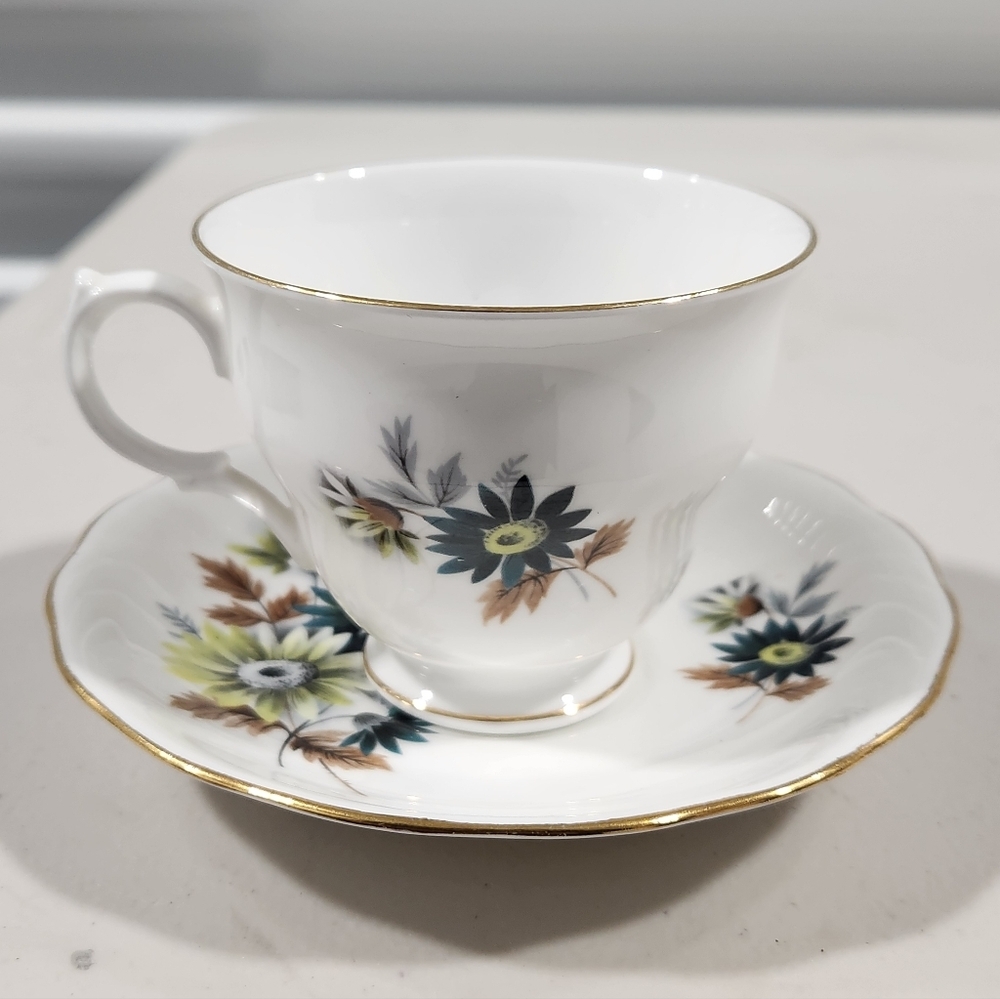 Queen Anne Bone China Teacup and Saucer with Floral Design and Gold Trim
